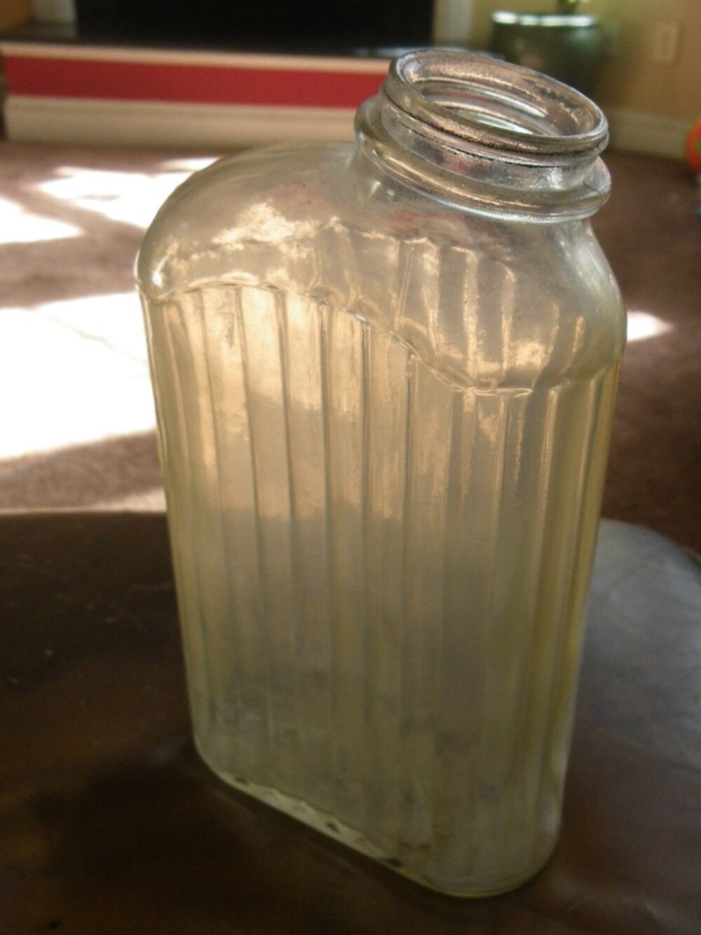 Vintage One Quart Glass Bottle Embossed Ribbed Clear Side Pour